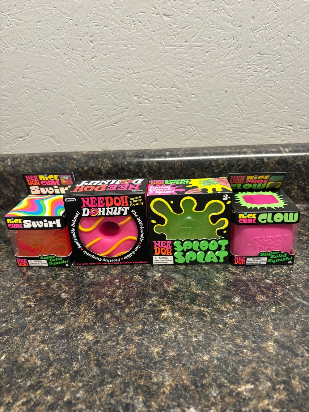 NeeDoh Lot. Swirl Cube, Dohnut, Spliot Splat, Glow.